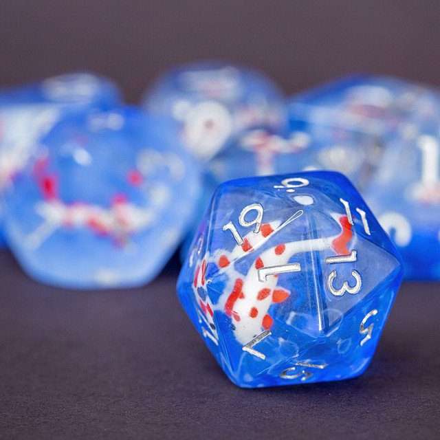 Sage's Familiars- Red Fish in Ocean Familiar Resin Polyhedral Dice Set - Sage's PortalResin Dice Set