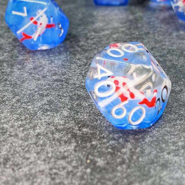Sage's Familiars- Red Fish in Ocean Familiar Resin Polyhedral Dice Set - Sage's PortalResin Dice Set