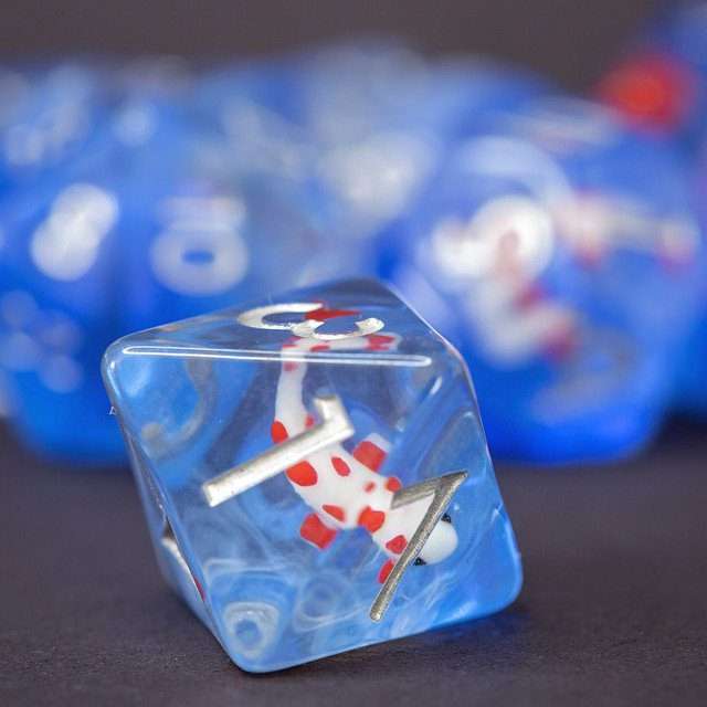 Sage's Familiars- Red Fish in Ocean Familiar Resin Polyhedral Dice Set - Sage's PortalResin Dice Set