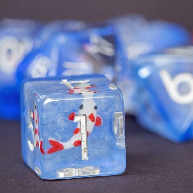 Sage's Familiars- Red Fish in Ocean Familiar Resin Polyhedral Dice Set - Sage's PortalResin Dice Set