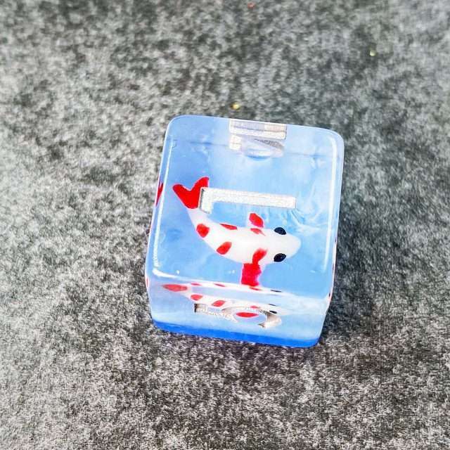 Sage's Familiars- Red Fish in Ocean Familiar Resin Polyhedral Dice Set - Sage's PortalResin Dice Set
