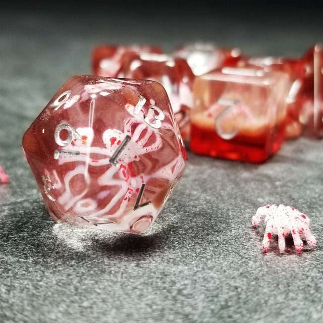 Sage's Familiars - Speckled Albino Spiderling in Red and Silver Ink Resin Polyhedral Dice Set - Sage's PortalResin Dice Set