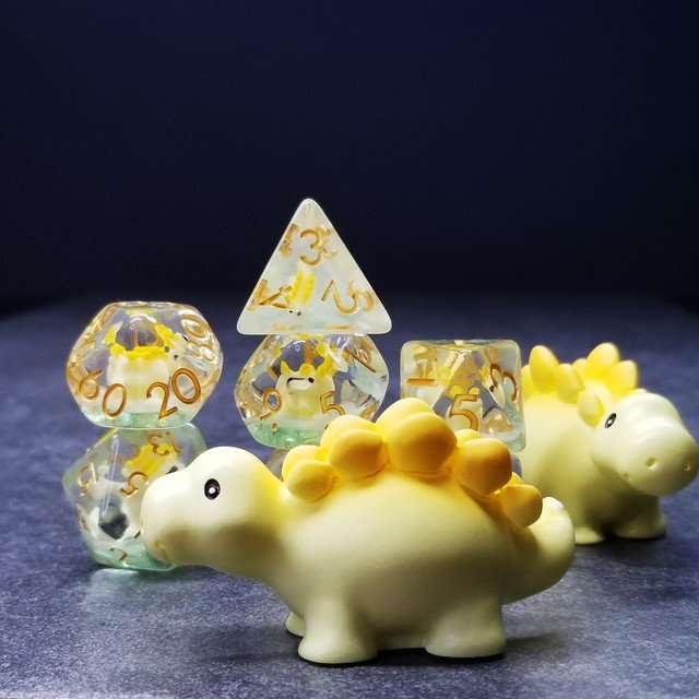 Sage's Familiars - Yellow Baby Stegosaurus Resin Polyhedral Dice Set - Sage's PortalResin Dice + Figurine Set
