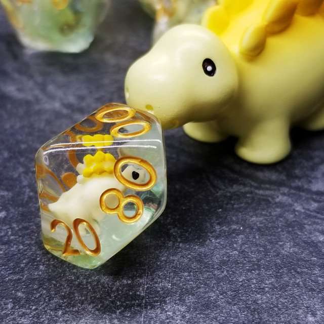 Sage's Familiars - Yellow Baby Stegosaurus Resin Polyhedral Dice Set - Sage's PortalResin Dice + Figurine Set