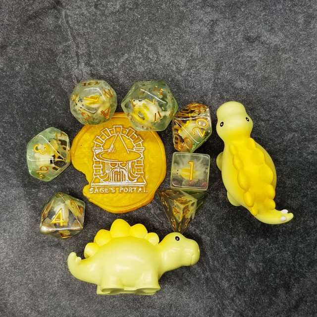 Sage's Familiars - Yellow Baby Stegosaurus Resin Polyhedral Dice Set - Sage's PortalResin Dice + Figurine Set