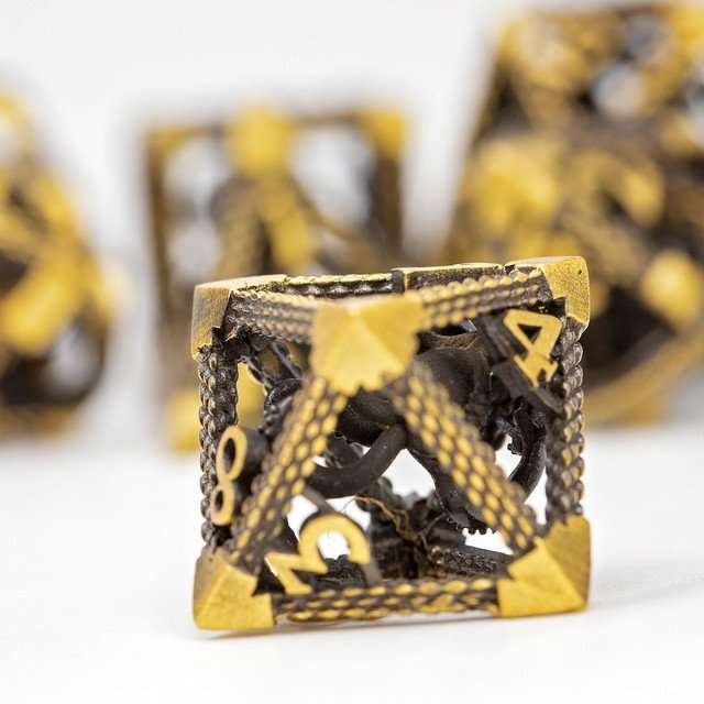 Sage's Imprisoned Kraken Brassy Depths Hollow Metal Dice Set - Sage's PortalHollow Metal Dice Set