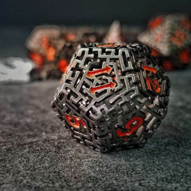 Sage's Labyrinths - Black Weave Red Ink Hollow Metal Polyhedral Dice Set - Sage's PortalHollow Metal Dice Set