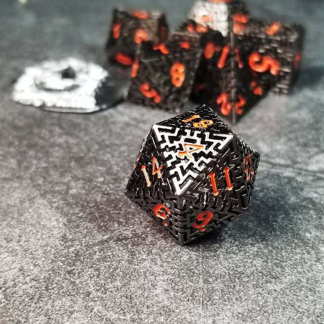 Sage's Labyrinths - Black Weave Red Ink Hollow Metal Polyhedral Dice Set - Sage's PortalHollow Metal Dice Set