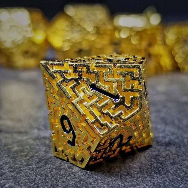 Sage's Labyrinths - Gold Weave Black Ink Hollow Metal Polyhedral Dice Set - Sage's PortalHollow Metal Dice Set
