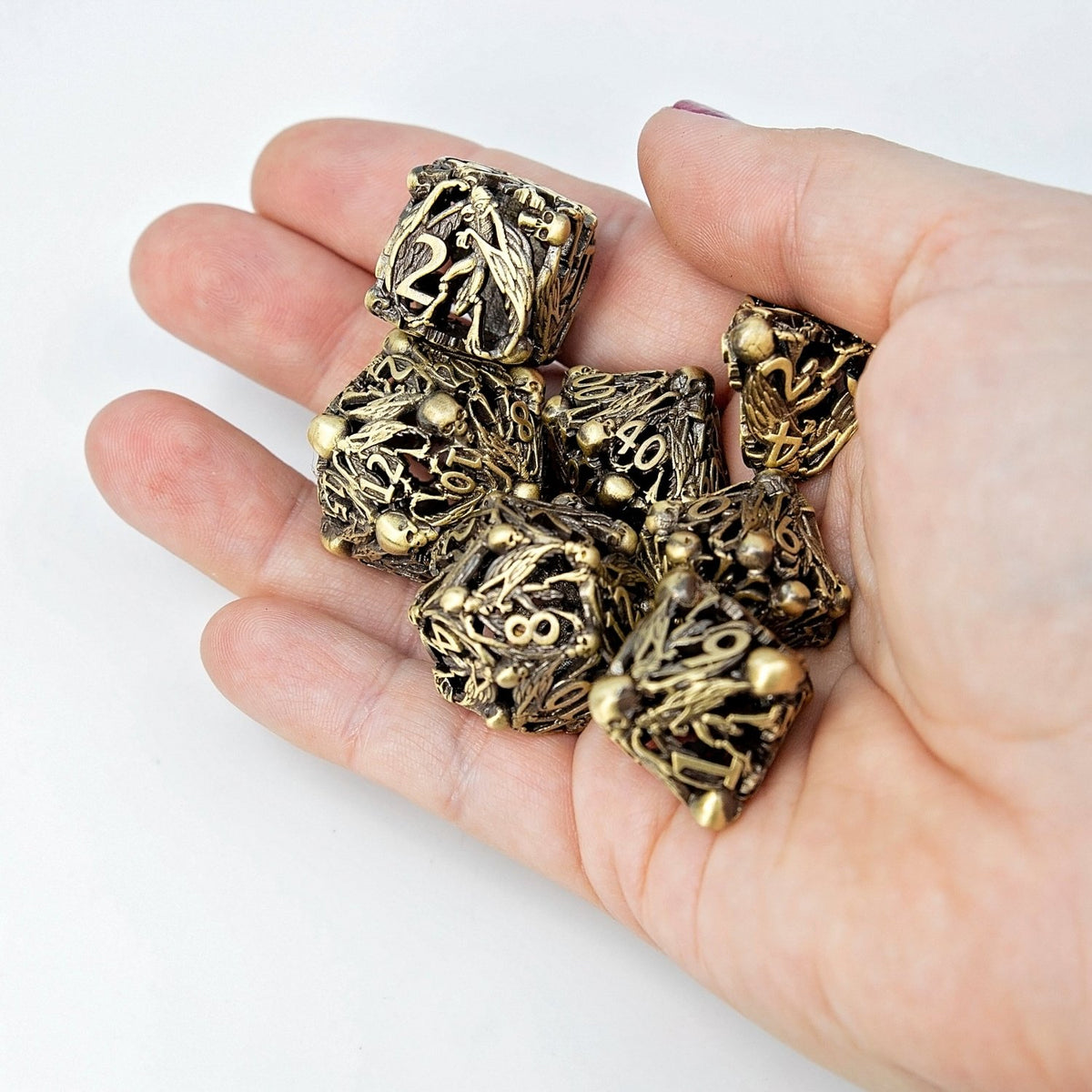 Sage's Macabre Bone Trinket Antique Gold Hollow Metal Dice Set - Sage's PortalHollow Metal Dice Set
