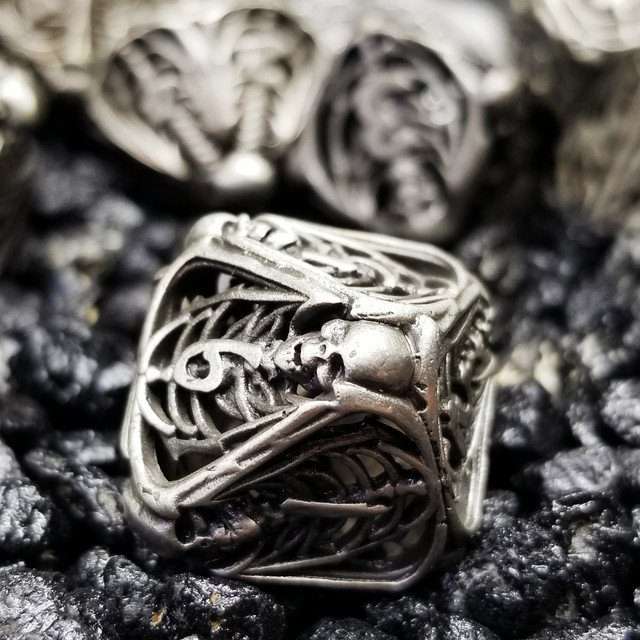 Sage's Macabre Bone Trinket Nickel Silver Hollow Metal Polyhedral Dice Set - Sage's PortalHollow Metal Dice Set