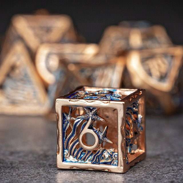 Sage's Mystery of the Oceans Copper/Blue Hollow Metal Polyhedral Dice Set - Sage's PortalHollow Metal Dice Set
