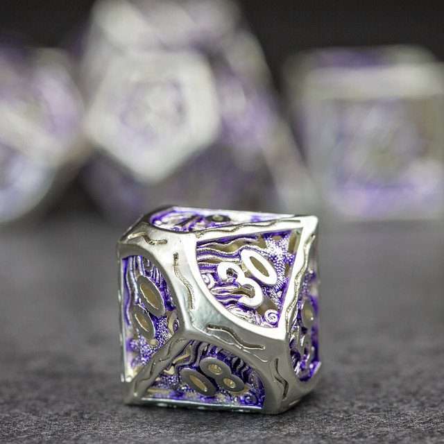 Sage's Mystery of the Oceans Purple/Silver Hollow Metal Polyhedral Dice Set - Sage's PortalHollow Metal Dice Set