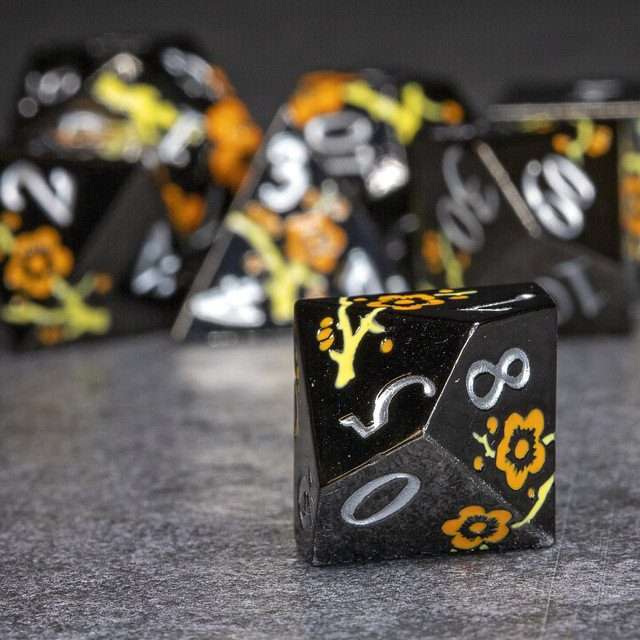 Sage's Petrified Flowers Black Orange/Yellow Flowers Metal Polyhedral Dice Set - Sage's PortalMetal Dice Set