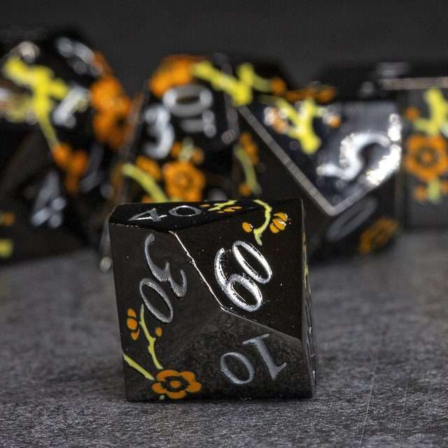 Sage's Petrified Flowers Black Orange/Yellow Flowers Metal Polyhedral Dice Set - Sage's PortalMetal Dice Set