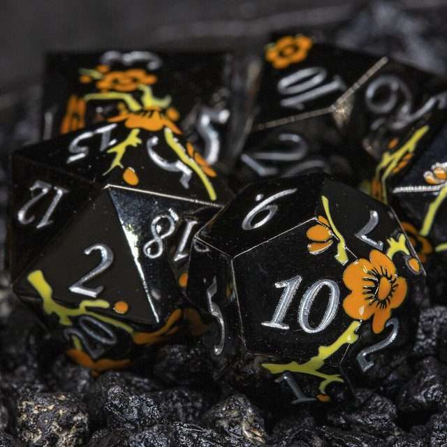 Sage's Petrified Flowers Black Orange/Yellow Flowers Metal Polyhedral Dice Set - Sage's PortalMetal Dice Set