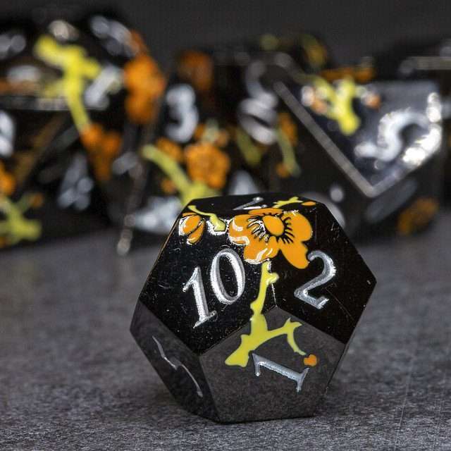 Sage's Petrified Flowers Black Orange/Yellow Flowers Metal Polyhedral Dice Set - Sage's PortalMetal Dice Set