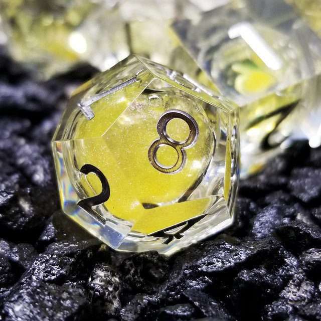 Sage's Radiant Souls - Sunburst Yellow Liquid Core Sharp Edge Resin Dice Set - Sage's PortalLiquid Core Dice Set